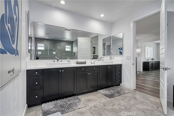Bathroom, Dual Sink Vanities, Interior, Recessed Lighting, Wood Texture Flooring