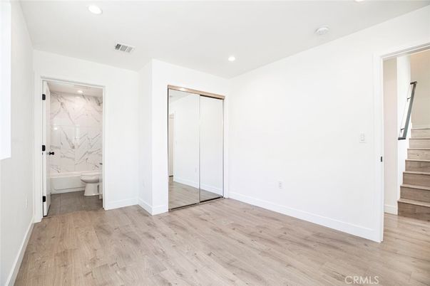 Bathroom, Empty room, Interior, Marble Walls, Recessed Lighting, Wood Texture Flooring