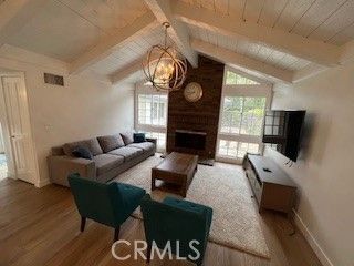 Chandelier, Fireplace, Interior, Living room, Wood Texture Flooring, Wooden Walls