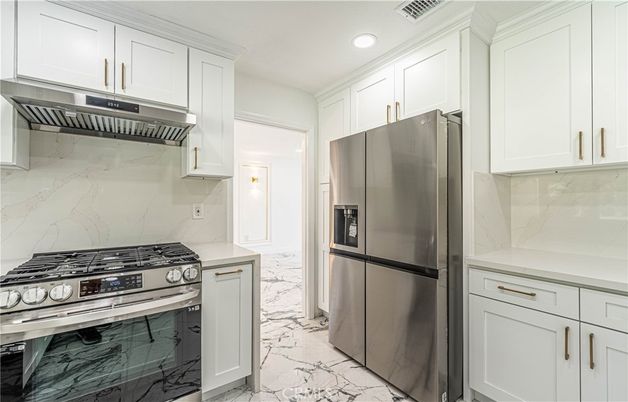 Interior, Kitchen, Marble, Marble Walls, Recessed Lighting, Stainless Steel Appliances