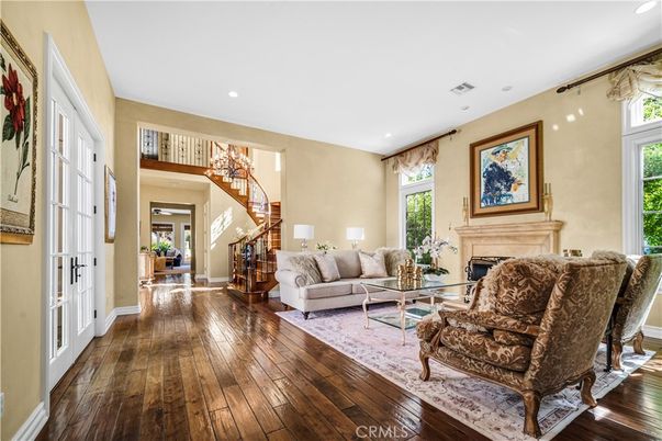Chandelier, Fireplace, Interior, Living room, Recessed Lighting, Wood Texture Flooring