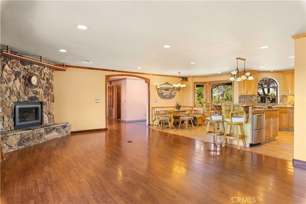 Chandelier, Dining room, Fireplace, Interior, Kitchen, Pendant Lights, Recessed Lighting, Wood Texture Flooring