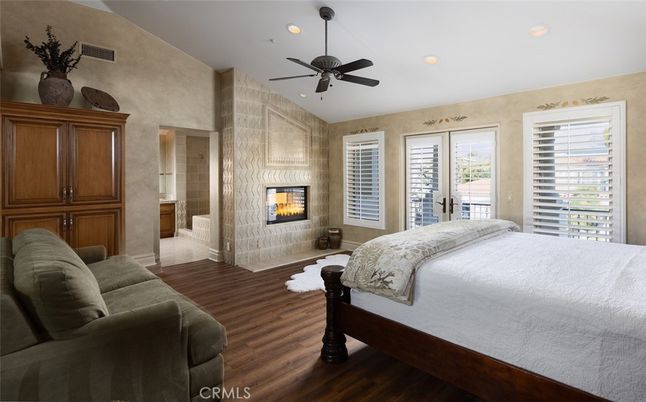 Bedroom, Fireplace, Interior, Recessed Lighting, Wood Texture Flooring