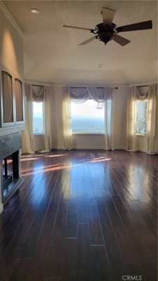 Empty room, Fireplace, Interior, Recessed Lighting, Wood Texture Flooring