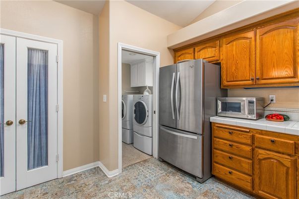 Interior, Kitchen, Tile Countertops, Washer