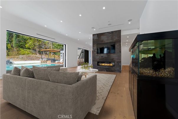 Fireplace, Interior, Living room, Recessed Lighting, Wood Texture Flooring