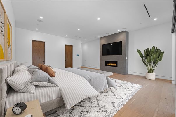 Bedroom, Fireplace, Interior, Recessed Lighting, Wood Texture Flooring
