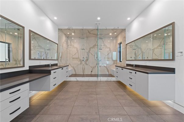 Bathroom, Dual Sink Vanities, Glass Shower, Interior, Marble Walls, Recessed Lighting