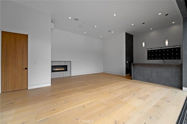 Empty room, Fireplace, Interior, Pendant Lights, Recessed Lighting, Wood Texture Flooring