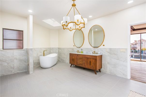Bathroom, Dual Sink Vanities, Free Standing Baths, Interior, Marble Walls, Recessed Lighting