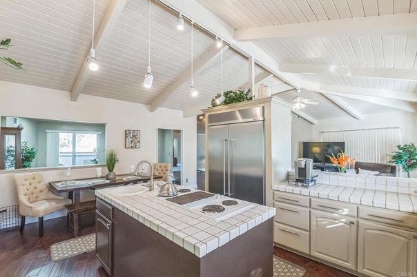 Interior, Kitchen, Pendant Lights, Stainless Steel Appliances, Tile Countertops, Wooden Beams, Wood Texture Flooring