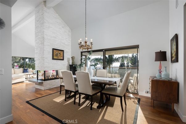 Dining room, Fireplace, Interior, Living room, Pendant Lights, Stone Walls, Wood Texture Flooring
