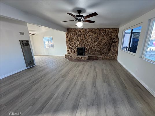 Empty room, Fireplace, Interior, Stone Walls, Wood Texture Flooring