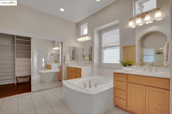 Bathroom, Dual Sink Vanities, Free Standing Baths, Interior, Recessed Lighting, Wood Texture Flooring