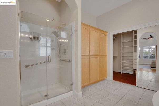 Bathroom, Glass Shower, Interior, Recessed Lighting, Walk-in Closets, Wood Texture Flooring