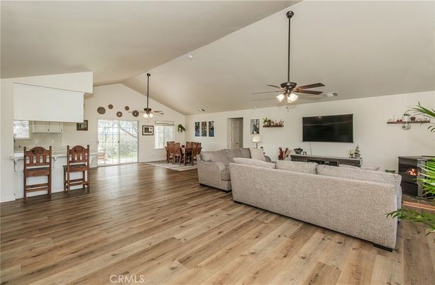 Dining room, Fireplace, Interior, Living room, Pendant Lights, Wood Texture Flooring