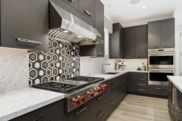 Interior, Kitchen, Marble Walls, Recessed Lighting, Stainless Steel Appliances, Wood Texture Flooring