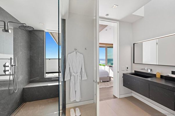 Bathroom, Bedroom, Dual Sink Vanities, Glass Shower, Interior, Recessed Lighting, Water, Wood Texture Flooring
