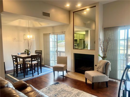 Dining room, Fireplace, Interior, Pendant Lights, Recessed Lighting, Wood Texture Flooring