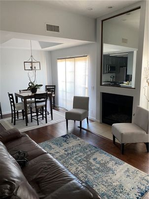 Dining room, Fireplace, Interior, Living room, Pendant Lights, Wood Texture Flooring
