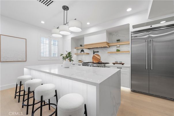 Interior, Kitchen, Marble Walls, Pendant Lights, Recessed Lighting, Stainless Steel Appliances, Wood Texture Flooring