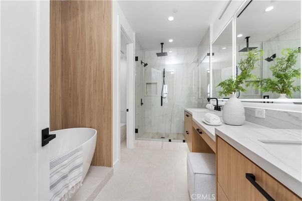 Bathroom, Dual Sink Vanities, Free Standing Baths, Glass Shower, Interior, Marble Walls, Recessed Lighting