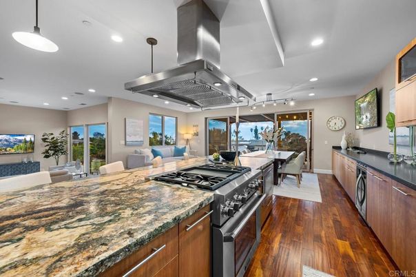 Dining room, Interior, Kitchen, Living room, Pendant Lights, Recessed Lighting, Stainless Steel Appliances, Wood Texture Flooring