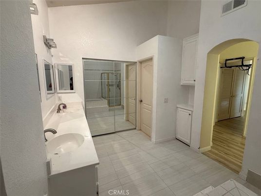 Bathroom, Dual Sink Vanities, Glass Shower, Interior, Wood Texture Flooring