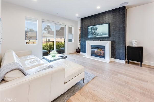 Fireplace, Interior, Living room, Recessed Lighting, Wood Texture Flooring