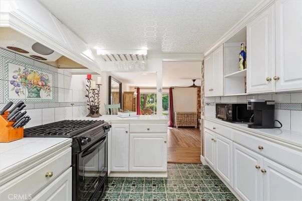 Interior, Kitchen, Tile Countertops, Wood Texture Flooring