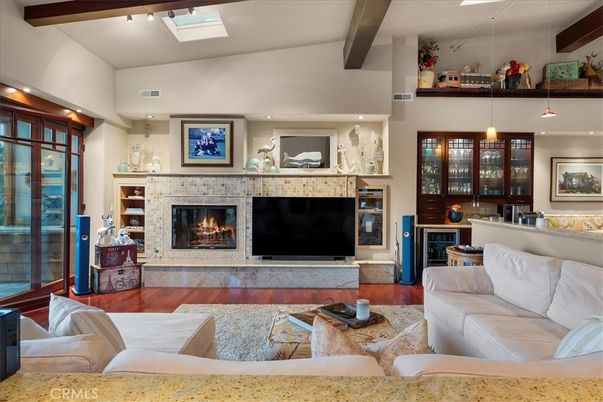 Fireplace, Interior, Living room, Pendant Lights, Recessed Lighting, Wooden Beams, Wood Texture Flooring