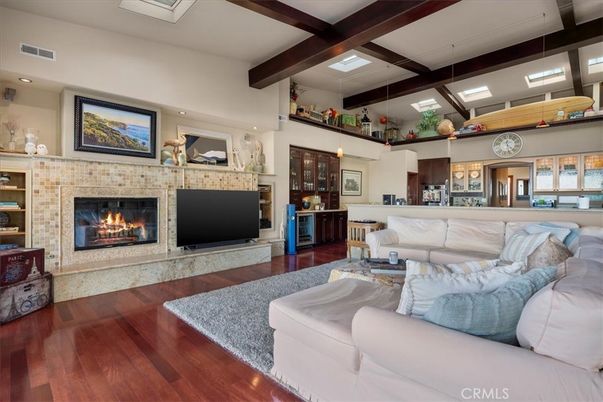 Fireplace, Interior, Living room, Pendant Lights, Recessed Lighting, Stone Walls, Wooden Beams, Wood Texture Flooring
