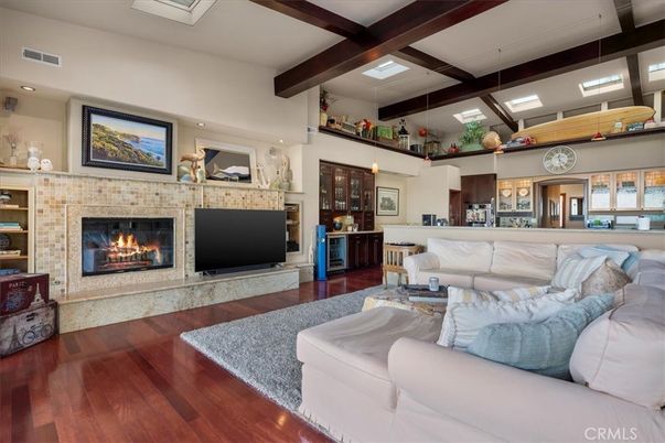 Fireplace, Interior, Living room, Pendant Lights, Recessed Lighting, Stone Walls, Wooden Beams, Wood Texture Flooring