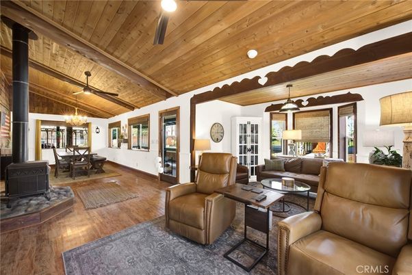 Chandelier, Dining room, Fireplace, Interior, Living room, Pendant Lights, Wooden Beams, Wooden Ceilings, Wood Texture Flooring