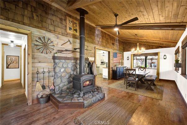Chandelier, Dining room, Fireplace, Interior, Stone Walls, Wooden Beams, Wooden Ceilings, Wood Texture Flooring, Wooden Walls