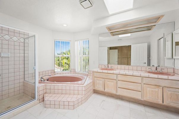 Bathroom, Dual Sink Vanities, Glass Shower, Interior, Marble, Recessed Lighting, Tile Countertops