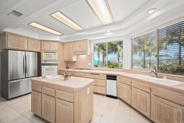 Interior, Kitchen, Recessed Lighting, Stainless Steel Appliances, Tile Countertops