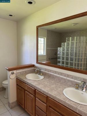 Bathroom, Dual Sink Vanities, Interior, Recessed Lighting, Tile Countertops