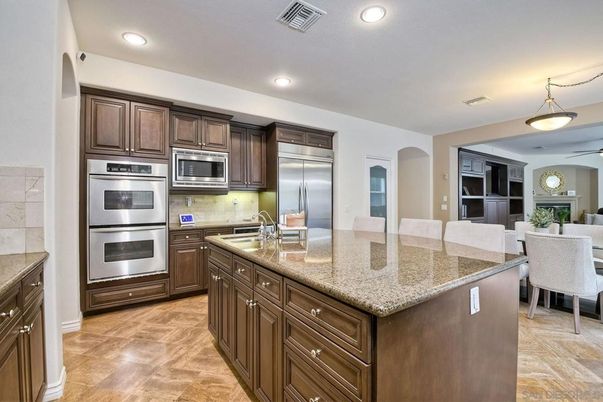Dining room, Interior, Kitchen, Recessed Lighting, Stainless Steel Appliances, Wood Texture Flooring