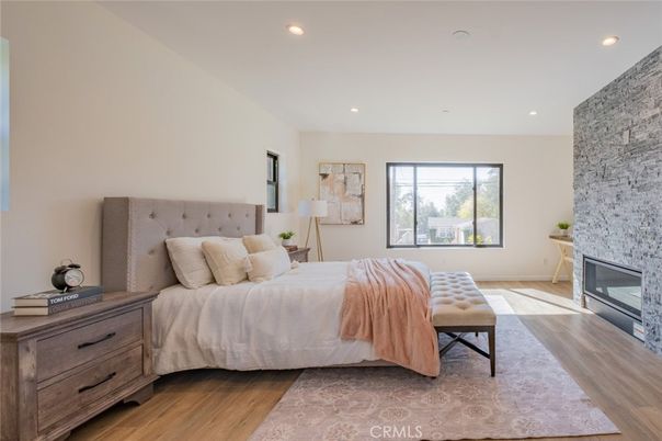 Bedroom, Fireplace, Interior, Recessed Lighting, Wood Texture Flooring