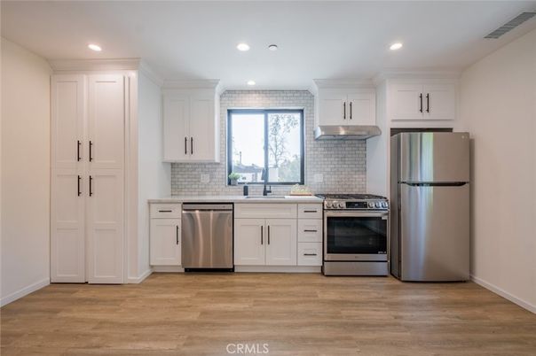 Interior, Kitchen, Recessed Lighting, Stainless Steel Appliances, Wood Texture Flooring
