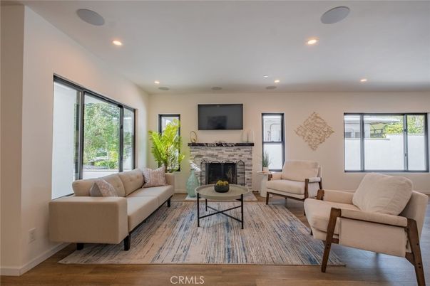 Fireplace, Interior, Living room, Recessed Lighting, Wood Texture Flooring