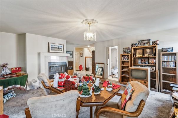 Chandelier, Dining room, Fireplace, Interior, Living room