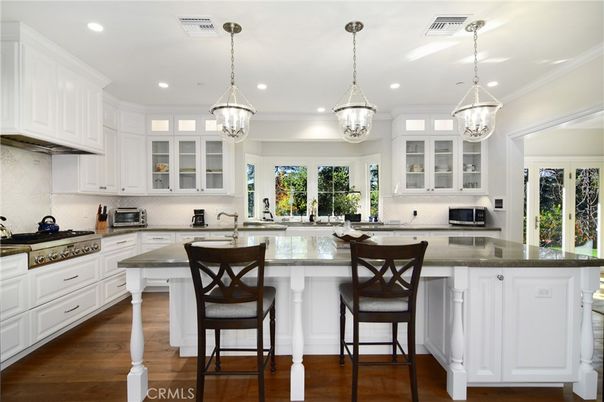 Chandelier, Interior, Kitchen, Pendant Lights, Recessed Lighting, Stainless Steel Appliances, Wood Texture Flooring