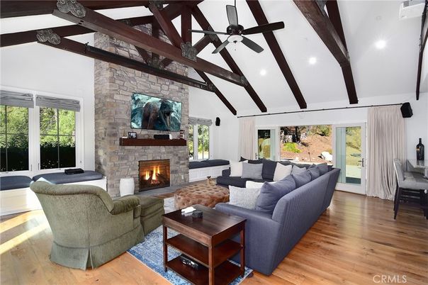 Fireplace, Interior, Living room, Recessed Lighting, Stone Walls, Wooden Beams, Wood Texture Flooring