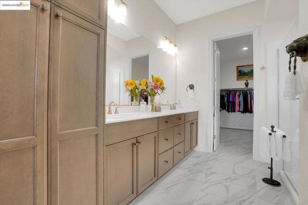 Bathroom, Dual Sink Vanities, Interior, Marble, Recessed Lighting, Walk-in Closets