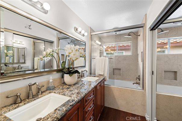 Bathroom, Dual Sink Vanities, Glass Shower, Interior, Wood Texture Flooring