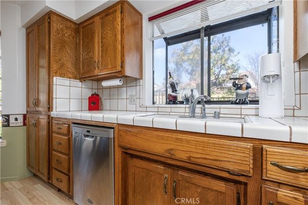 Interior, Kitchen, Tile Countertops, Wood Texture Flooring