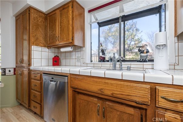 Interior, Kitchen, Tile Countertops, Wood Texture Flooring