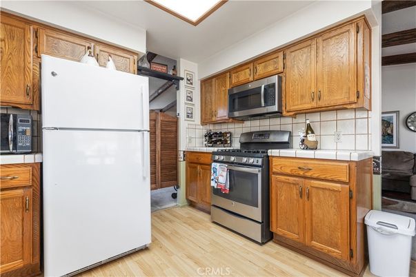 Interior, Kitchen, Tile Countertops, Wood Texture Flooring